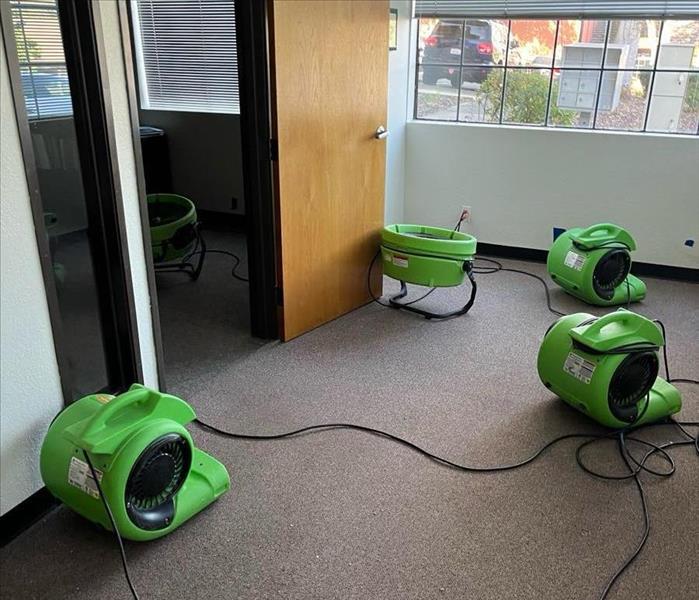 SERVPRO fans drying wet carpet